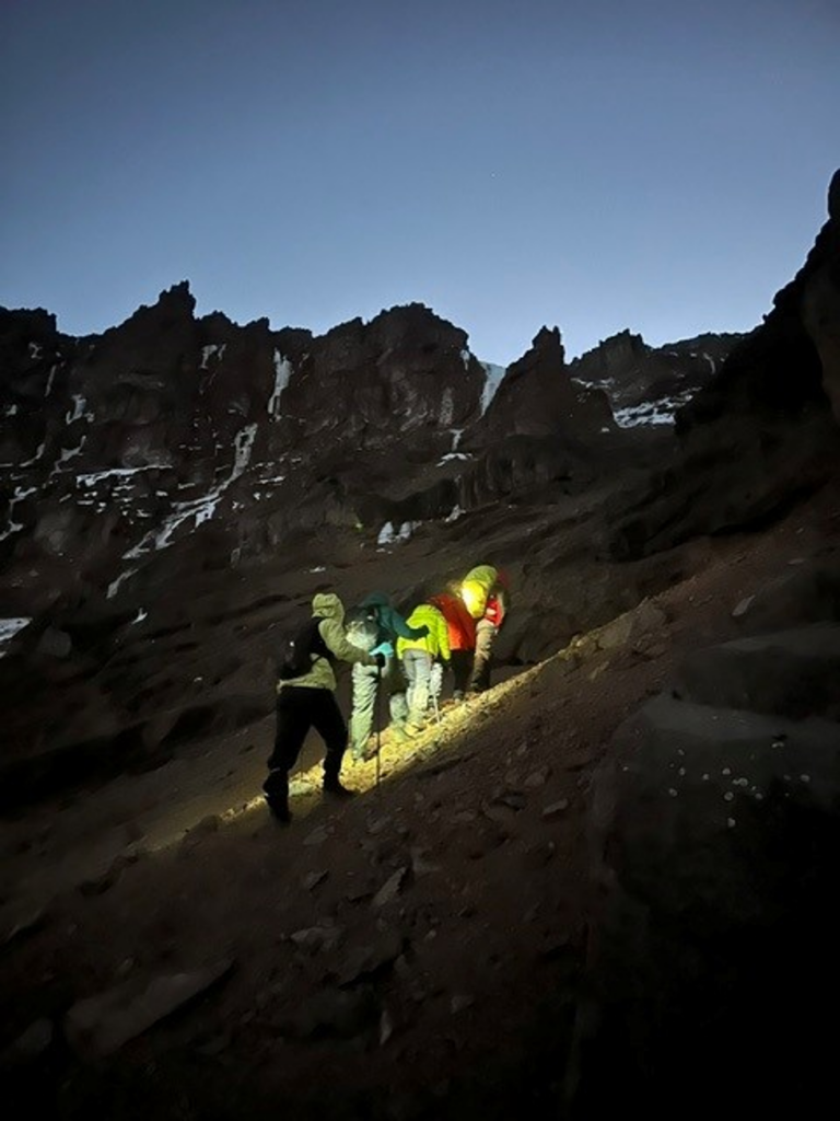 Dr. Sara and team climbing Kilimanjaro 